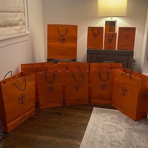 Hermès Orange Shopping Bags.